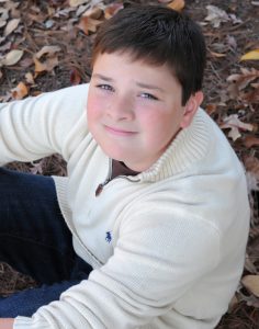 Tampa Children's photography, teen boy, fall leave portraits